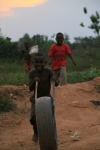 Africa-Togo-Playing_with_wheel.jpg